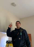 ACFD changing smoke detector (2)